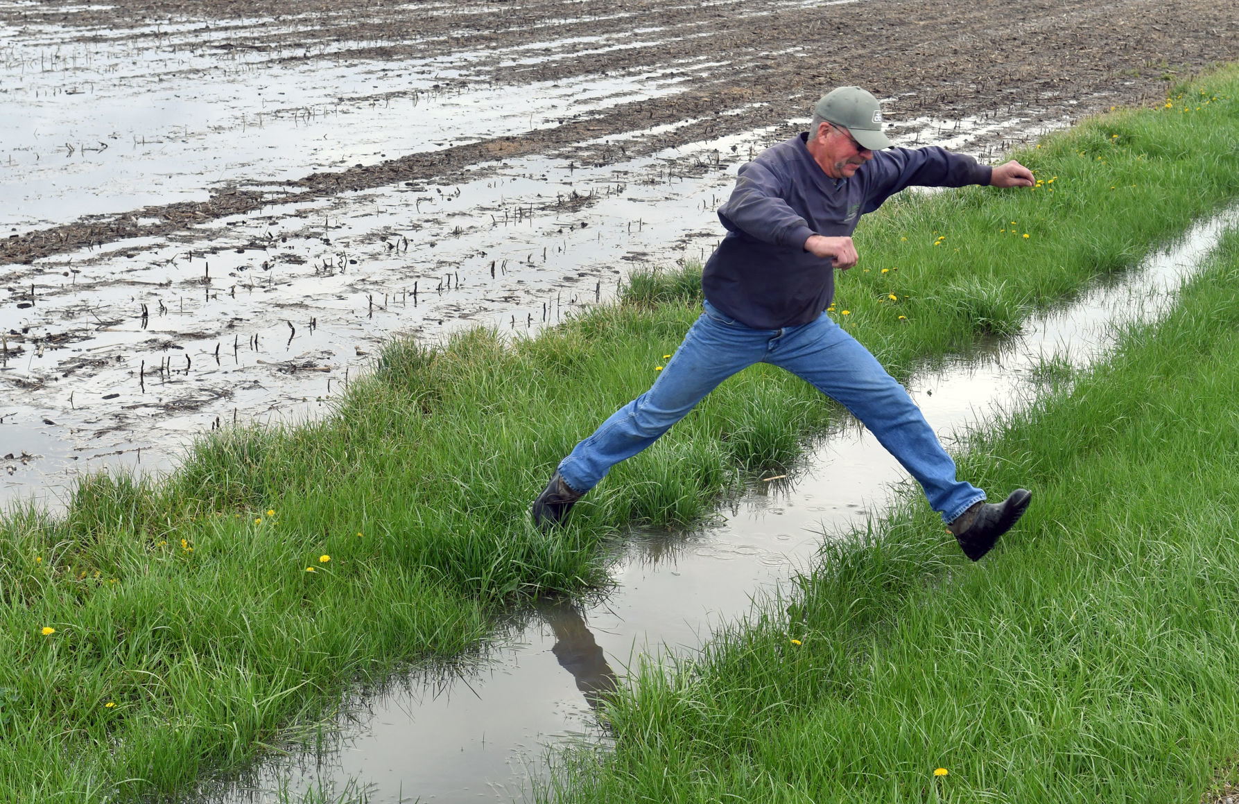 Farmers dealing with flooded fields